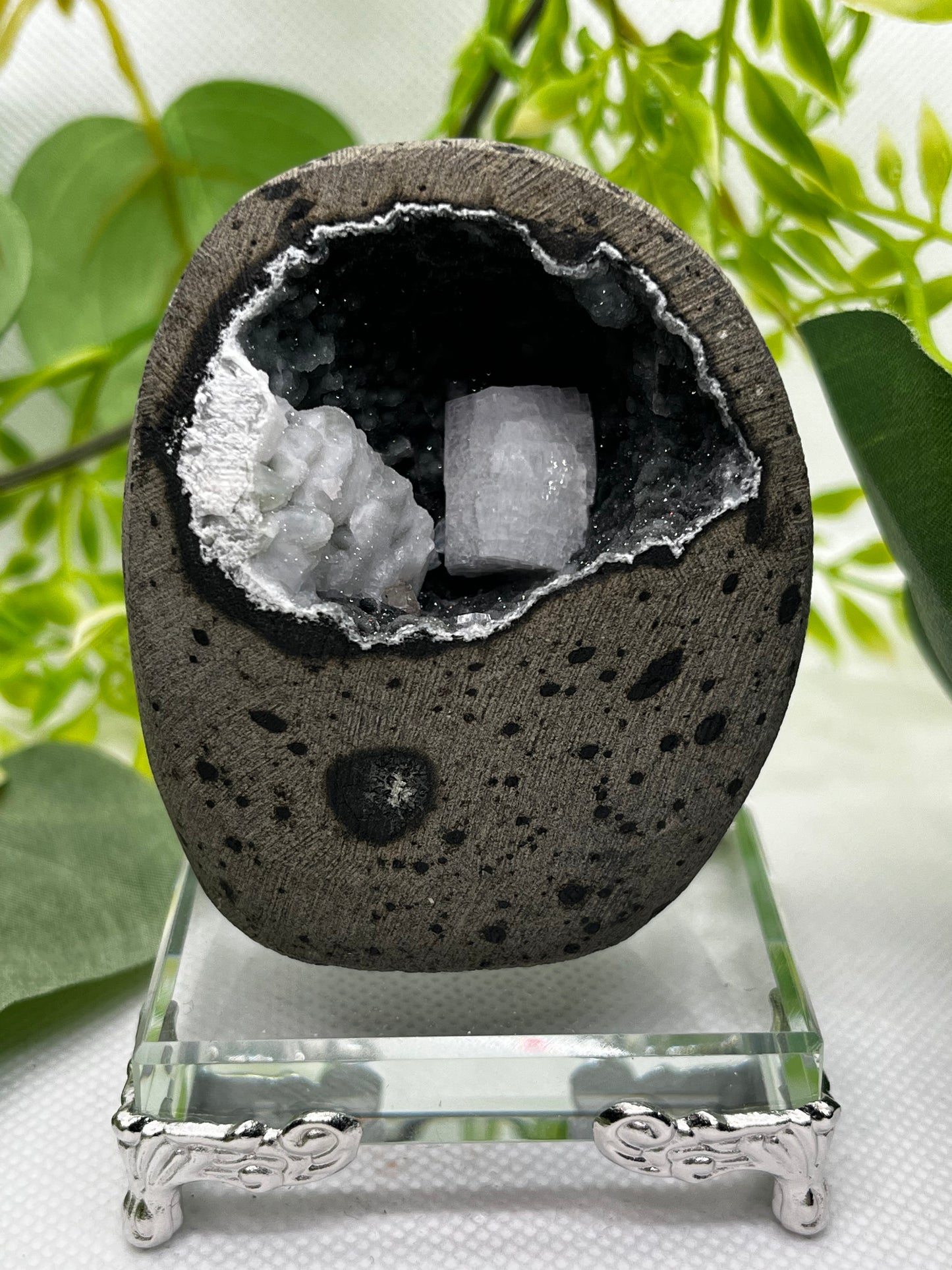 Calcite on black chalcedony geode A